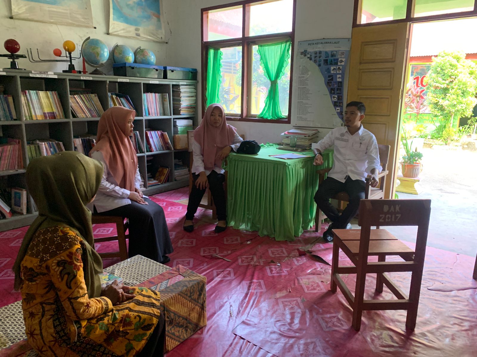 Monitoring dan Evaluasi Layanan Perpustakaan Keliling di UPT SDN 35 Ambacang Kamba